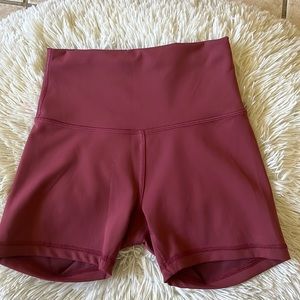 Lululemon Wunder Trains 4 inch shorts Dark Rose color Size 4